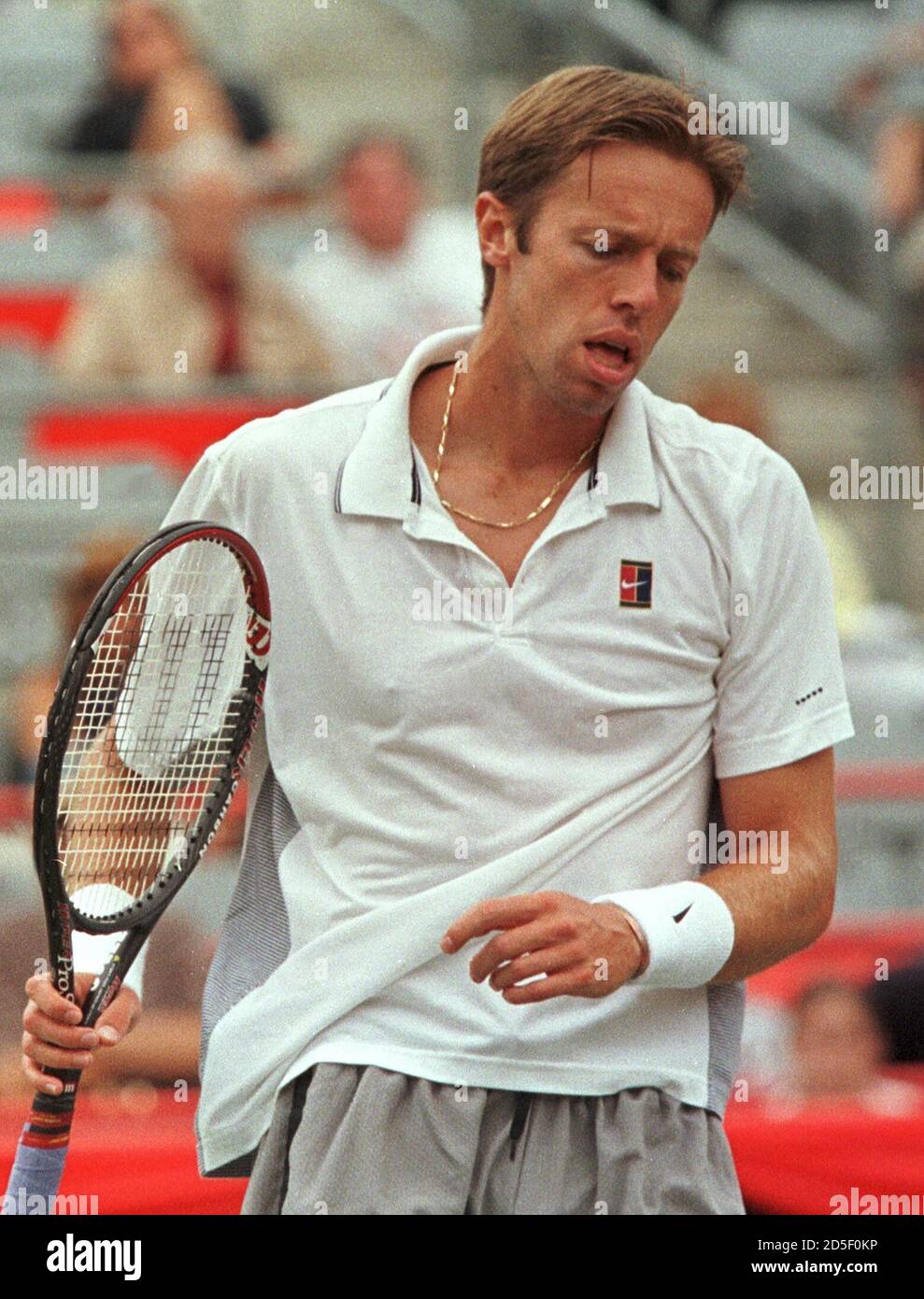 Canadian Daniel Nestor is dejected during his straight set loss in the  second round at the duMaurier Open Tennis tournament in Montreal, August 4.  Nestor lost to Yevgeny Kafelnikov 6-3 6-4. JY/TB