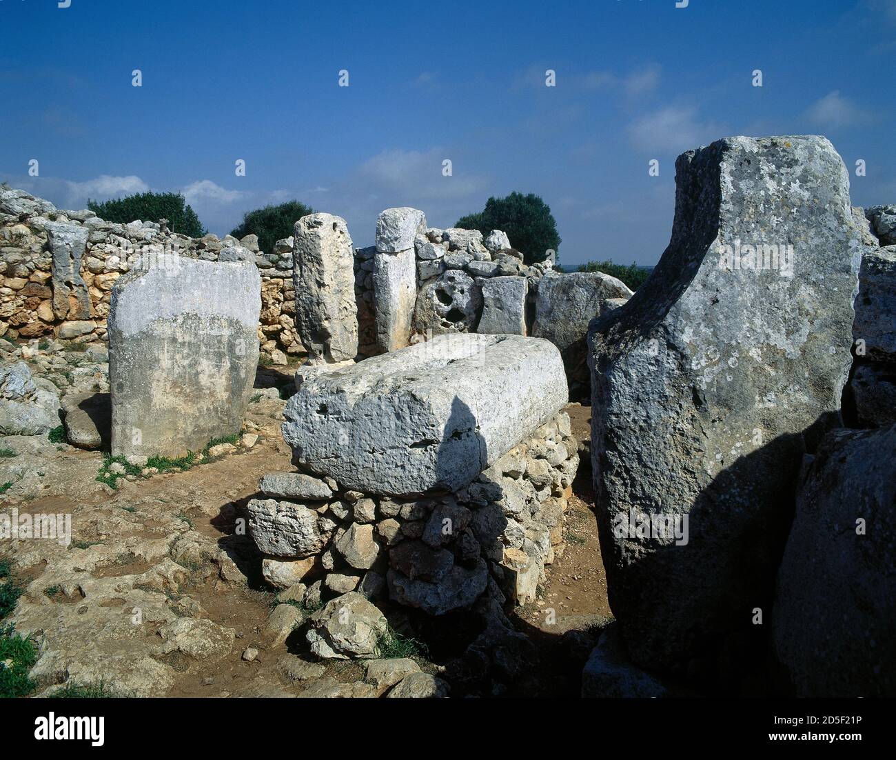 Spain, Balearic Islands, Menorca, Alaior. Torre d'en Galmés talayotic settlement. It was occupied during the Early Bronze Age, around 1600 BC, remaining there until the medieval era. Taula enclosure. Stock Photo
