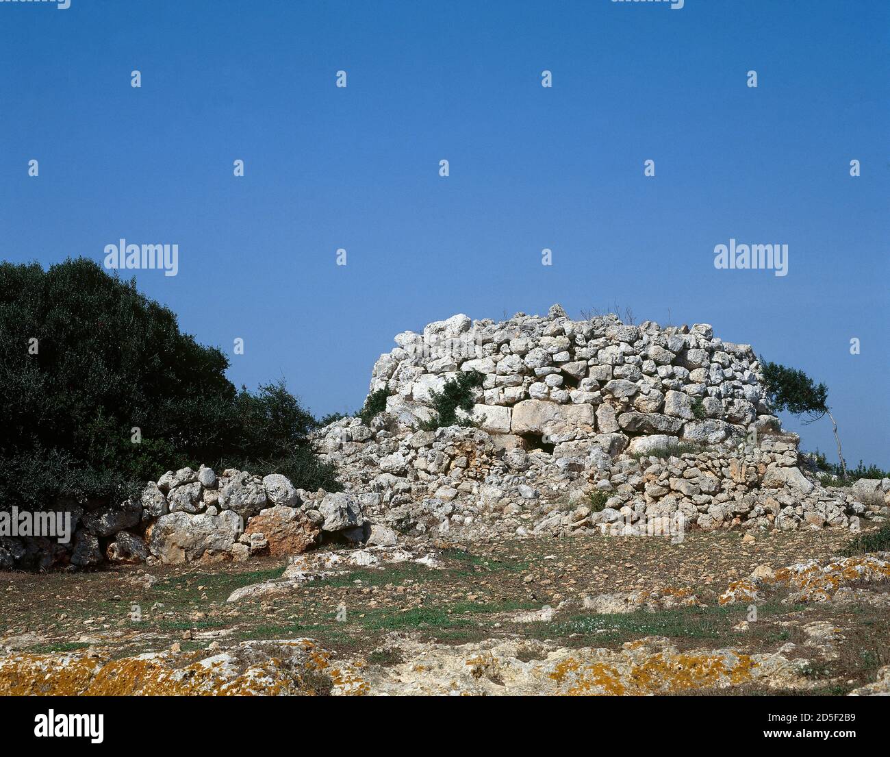 Spain, Balearic Islands, Menorca, Es Migjorn Gran. Talayotic settlement in the village of Sant Agusti Vell. Talayot. Bronze Age. Cyclopean architecture that the Balearic Islands' first settlers developed in the region from the 15th century BC.e Stock Photo