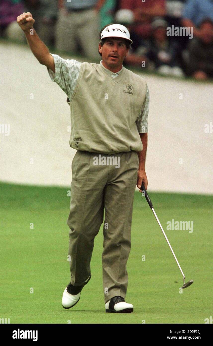 Fred Couples pumps his fist as he celebrates a birdie on the 16th hole,  that secures his lead during the second round of Masters play at the  Augusta National Golf Club April