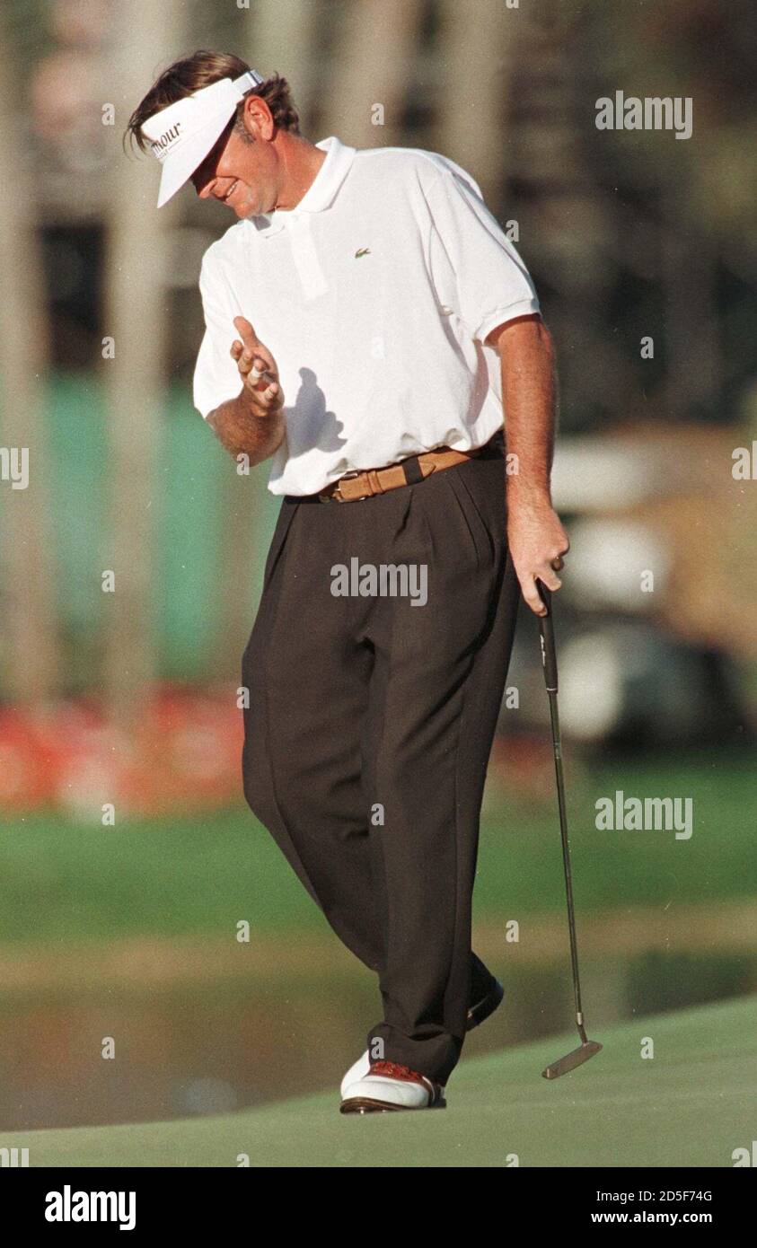 Tommy Armour III reacts after missing a birdie putt on the 18th hole March  4 during the first round of the Doral Ryder Open. Armour, who is one of  four leaders, finished