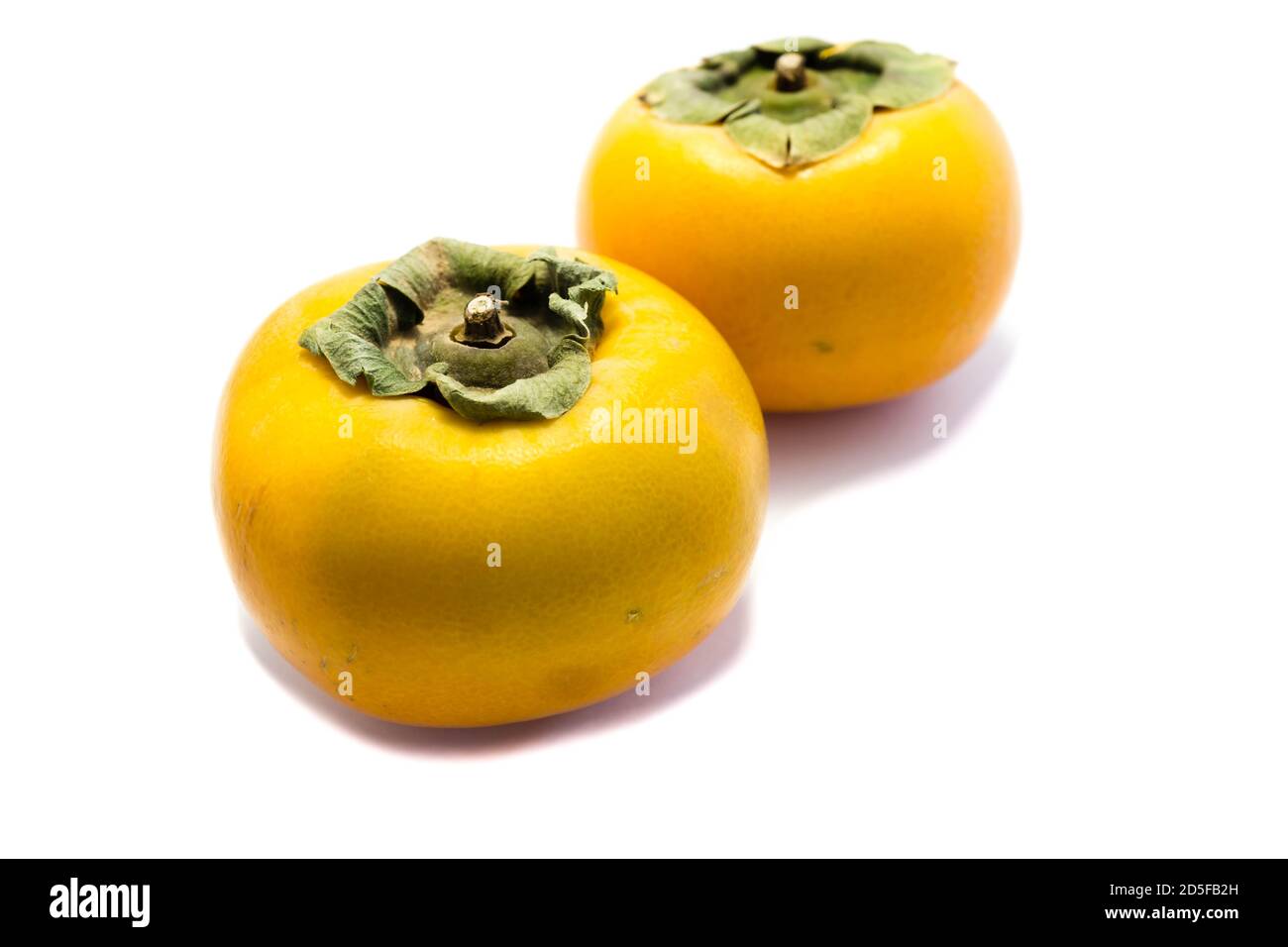 Persimmon fruit isolated on white background Stock Photo
