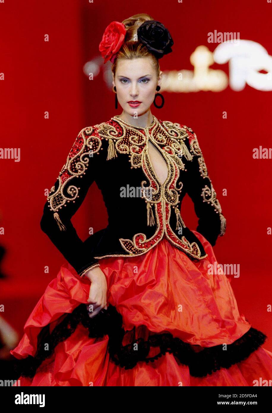 A model for Renato Balestra wears an evening dress styled like a  bullfighters costume as part of the autumn/winter 1996-97 collection July  16. Balestra used reds and blacks as he dedicated his