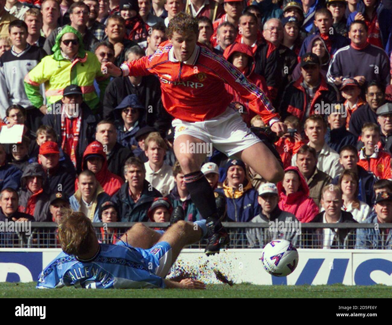 Manchester United Soccer Star Ole Gunnar Solskjaer R Is Tackled By Coventry City Player Jean Guy