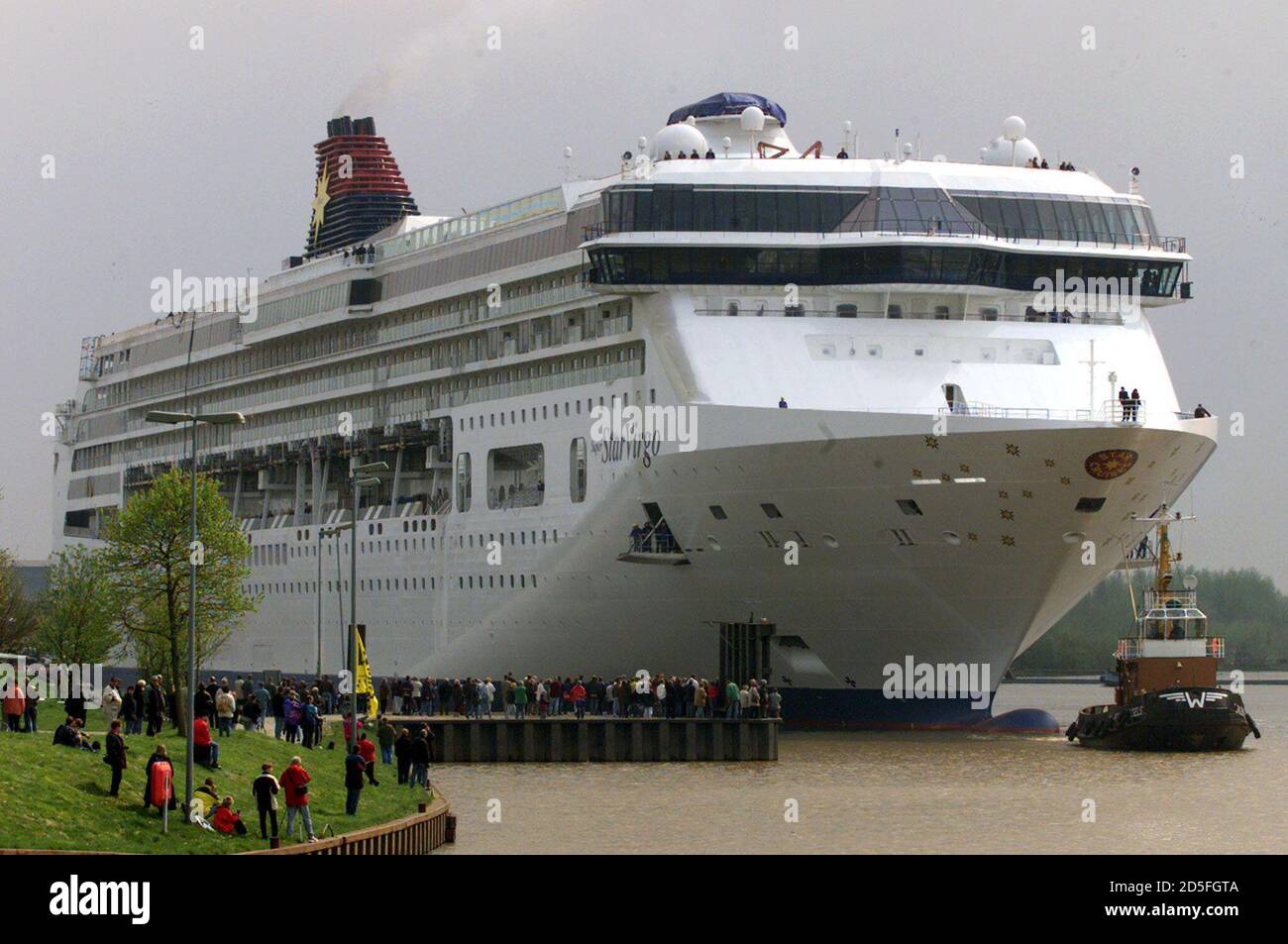 A Tug Pulls The New Cruiseliner Super Star Virgo Into A Dock Of The Northern German Meyer Shipyard In Papenburg Near The River Ems April 17 The 268 Metre Cruiseliner Was Built