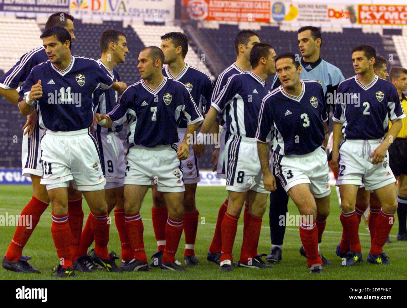 Members of the Yugoslav national soccer team walk onto the Touba soccer  field in Thessaloniki before a European championship qualifying match  against Malta for Euro 2000 June 8. Team members (L-R) Dejan