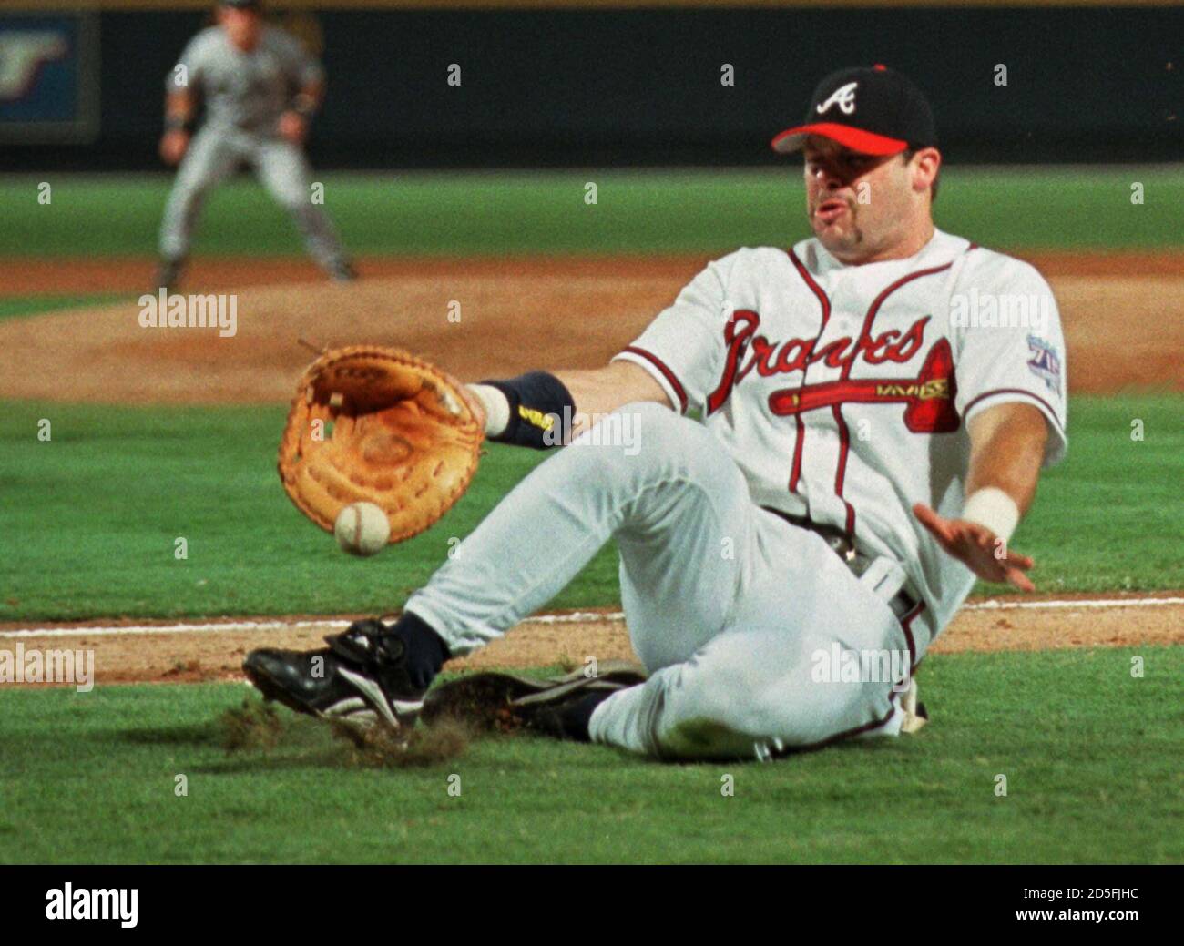 Atlanta Braves First Baseman Ryan Klesko Just Misses A Bunt Pop Off The Bat Of Houston Astros Shane Reynolds In The Fifth Inning In Atlanta On August 10 Reynolds Struck Out Bunting