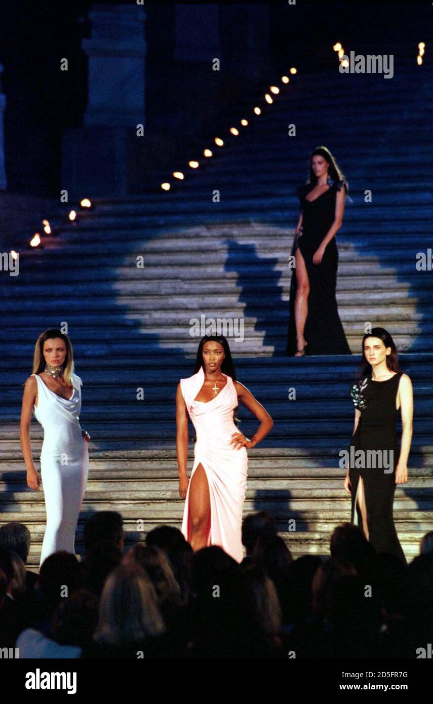British supermodel Naomi Campbell (C) displays with other models Gianni  Versace's collection at Rome's Spanish steps during a gala fashion show on  September 11. Campbell and other supermodels paid homage to murdered