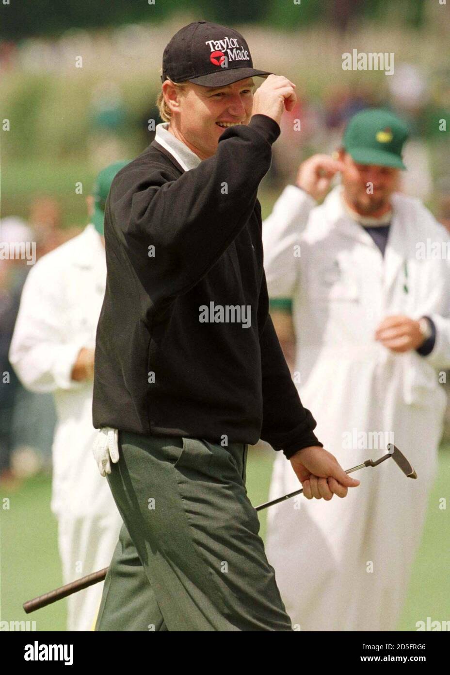 Ernie Els of South Africa tips his cap 