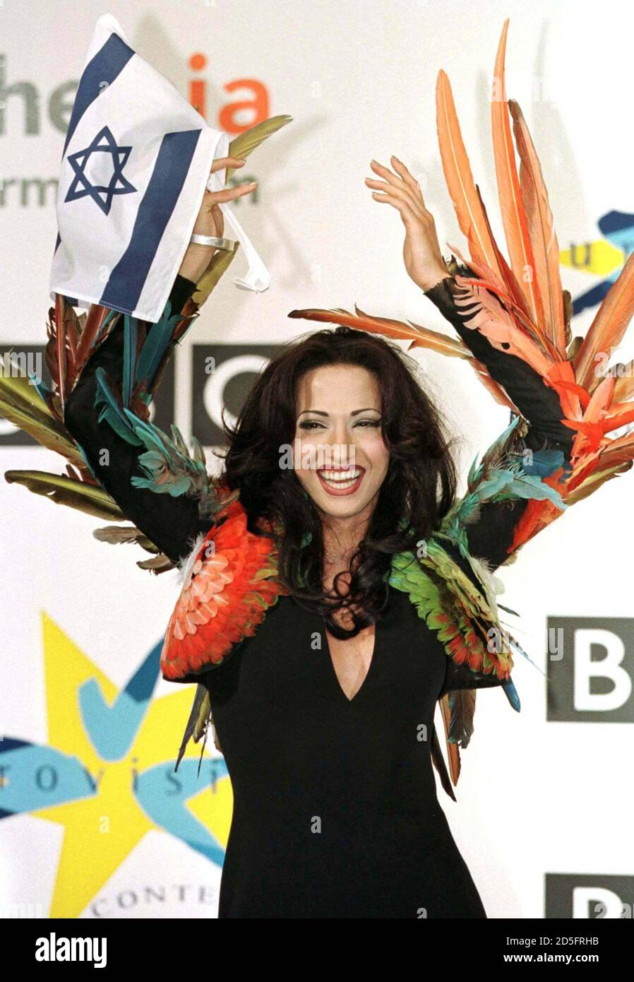 Israel's transsexual Dana International celebrates winning Eurovision Song contest at the National Indoor in