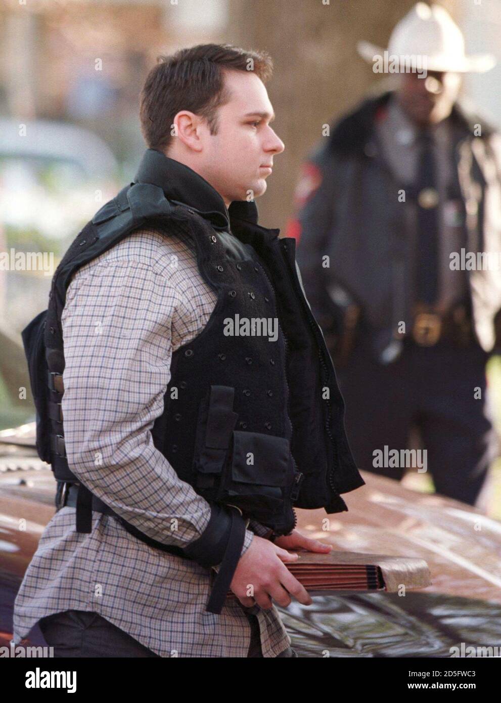 John William 'Bill' King, 24, accused in the dragging death of James Byrd Jr., walks towards the Jasper County Courthouse in another day of his capital murder trial, February 19. Byrd, 49, was dragged to his death eight months ago in Jasper, Texas. Stock Photo