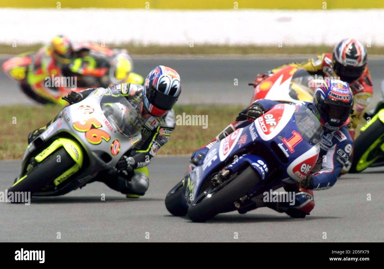 Race winner Loris Capriossi of Italy (1) leads second place Shinya Nakano  of Japan (56) through a turn during the 250cc category race of the  Malaysian Motorcycle Grand Prix April 18. Thoru