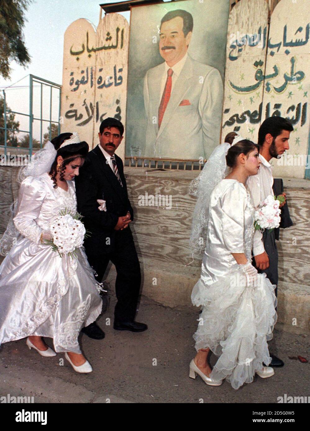 Couples Attend A Mass Wedding Prepared And Paid For By The Iraqi Youth Assocition A Body Chaired By President Saddam Hussein S Elder Son Uday October 14 One Hundred And Twenty Couples Got