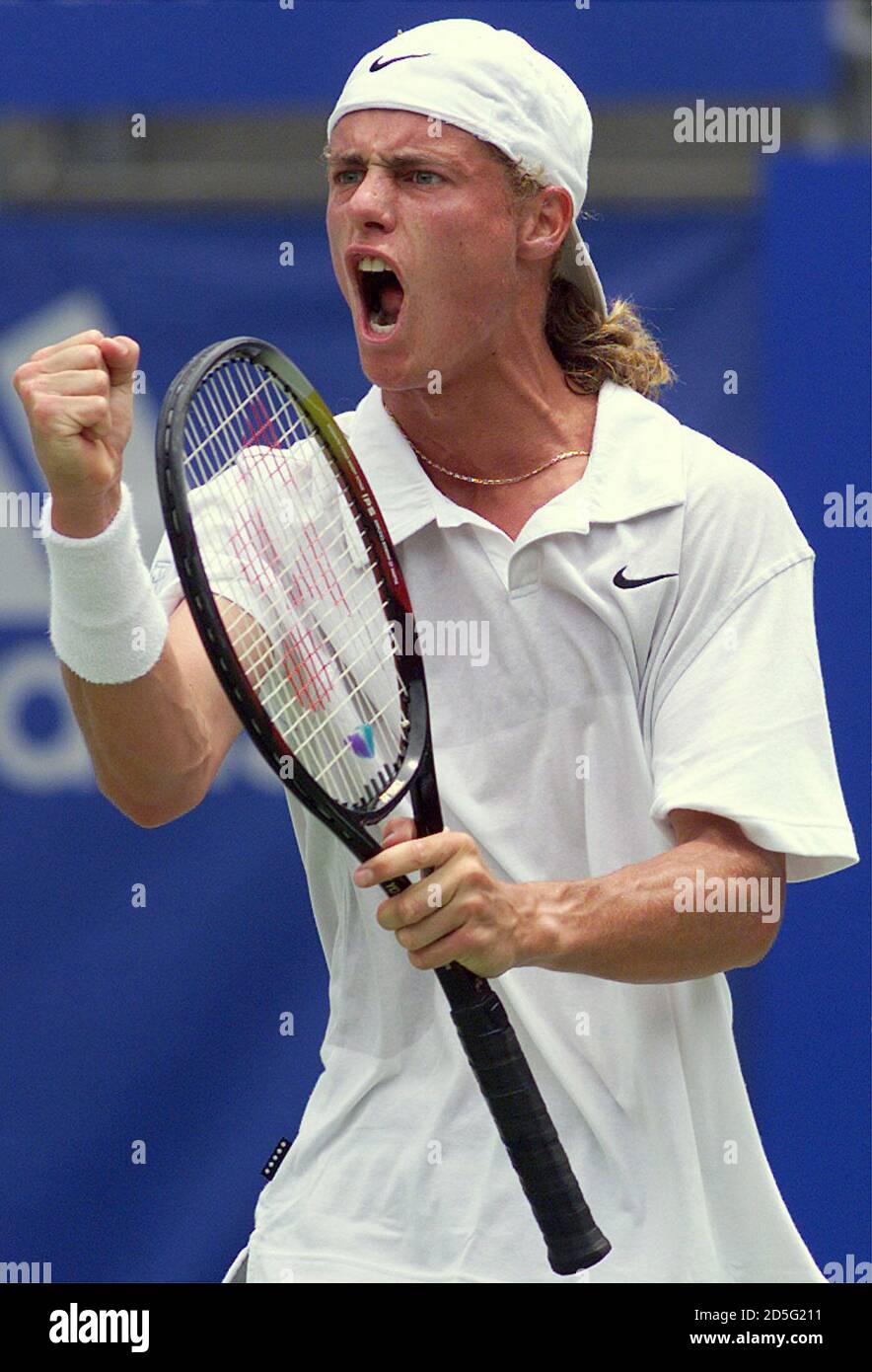 Lleyton Hewitt from Australia reacts after making a passing shot on his way  to defeating [compatriate Jason Stoltenberg] in the Mens singles final at  the Sydney international tennis tournament January 15. Hewitt