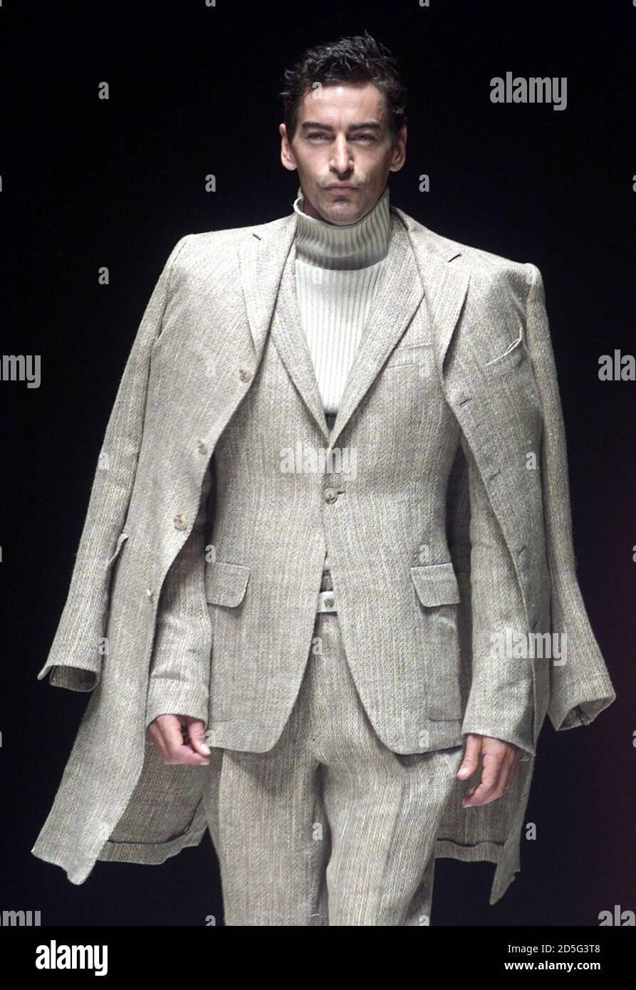 A Model Present An Outfits As Part Of Gianfranco Ferre Spring Summer 01 Ready To Wear Men Fashion Show At Milan June 29 The Milan Fashion Show Will Run Until June 30 Stock Photo