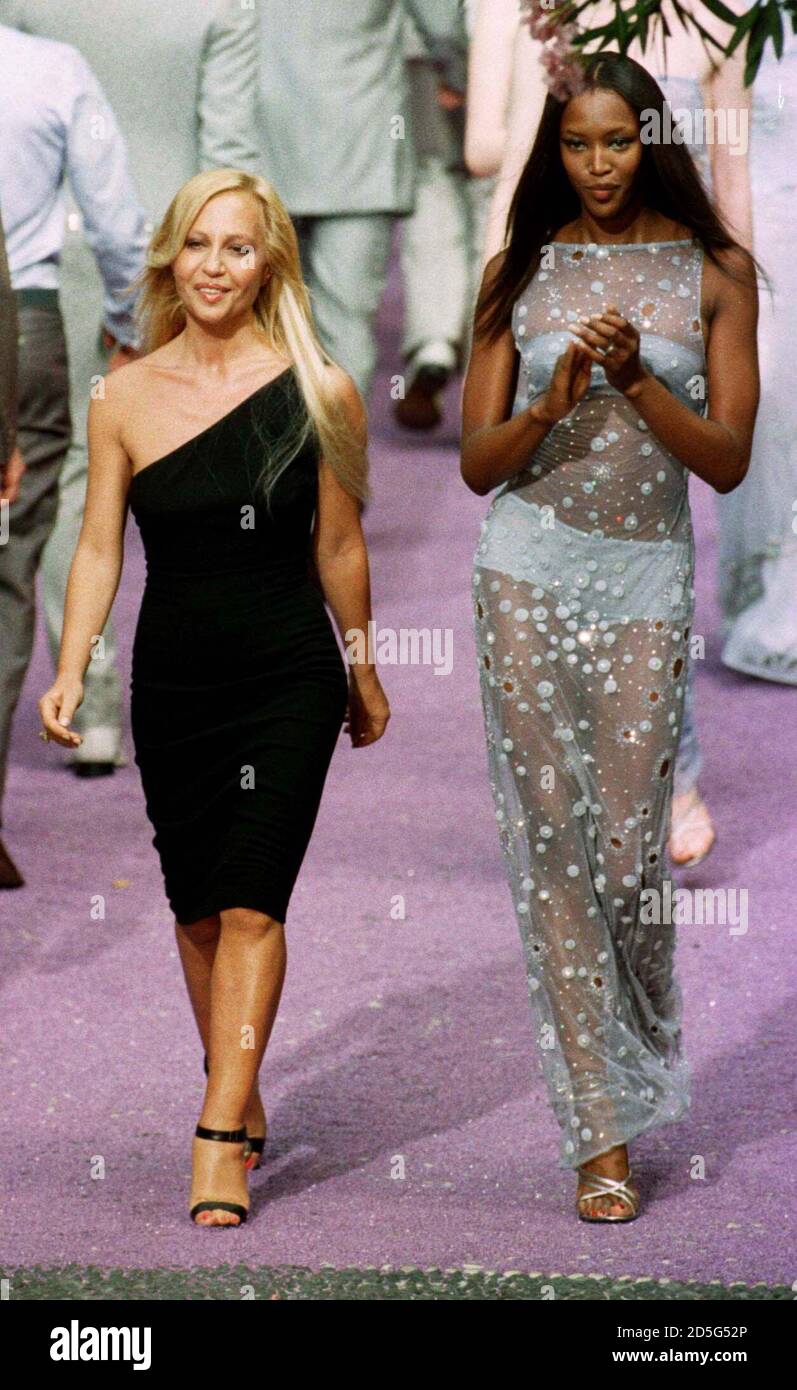 Fashion designer Donatella Versace (L) and model Naomi Campbell following a  Gianni Versace men's fashion show on the first day of men's ready-to-wear  Spring-Summer 1999 fashion week in Milan June 28 Stock