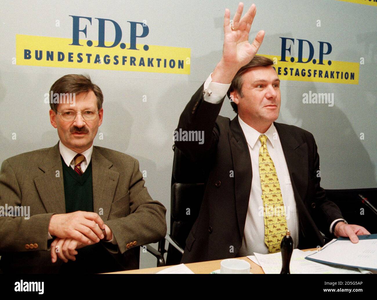 Free Democratic party leader Wolfgang Gerhard (R) gestures as FDP parliamenatry leader Hermann Otto Solms (L) looks on at the start of a meeting of the FDP parliamentary group, October 5. Gerhard is expected to succeed Solms as new FDP parliamenatry leader after loosing general elections.  MUR/ME Stock Photo