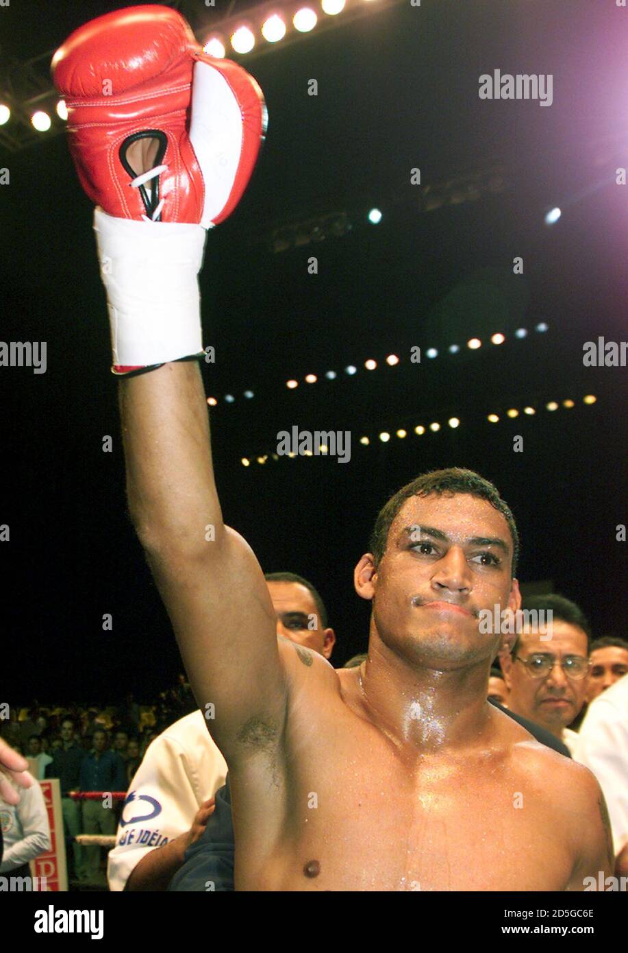 Champion Acelino Popo de Freitas celebrates after he knocked out Mexican  challenger Javier Jauregui during the (WBO) World Organization of Box super  feather weight title bout in Sao Paulo late March 18.