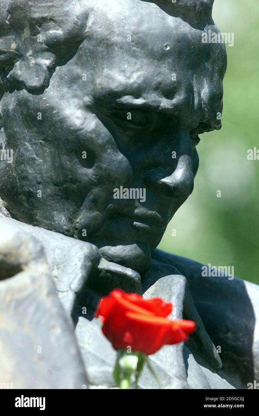 A red rose decorates a monument to the late Yugoslav President Josip Broz  Tito in central Sarajevo May 4. Hundreds of Sarajevans gathered to honour  Marshal Tito on the 20th anniversary of