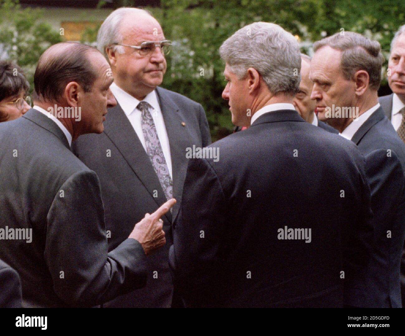 American President Bill Clinton Germany S Chancellor Helmut Kohl C And Canadian Prime Minister Jean Chretien R Look On As French President Jacques Chirac L Gestures As The Leaders Meet At Government House