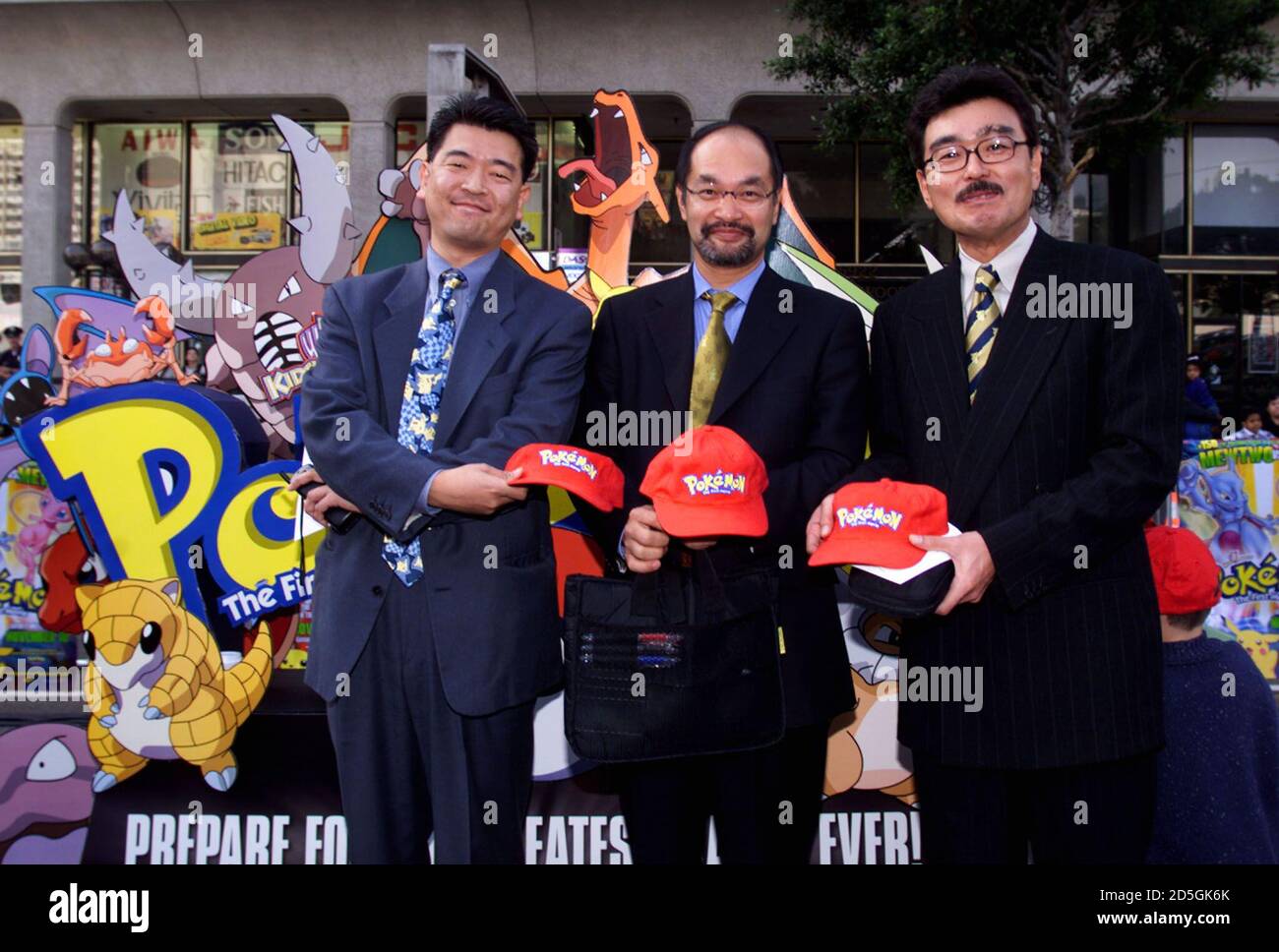 Producers of the animated film ' Pokemon The First Movie' pose together at the film's premiere November 6, at Mann's Chinese Theatre in Hollywood. From the left are: Takemoto Mori, producer, Masakazu Kubo, executive producer, and Toshiaki Okuno, animation producer. The animated adventure is based on the hit Japanese television series and video game.  RMP Stock Photo