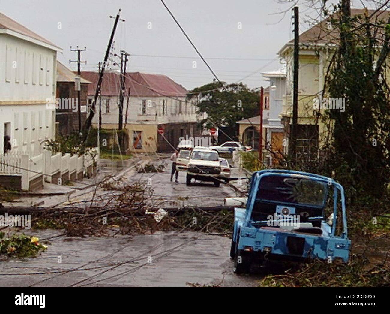 A tangled mess of wires from downed power lines is shown September 21  outside the Red Cross in Charlestown, the main town in Nevis, in the wake  of Hurricane Georges. There is