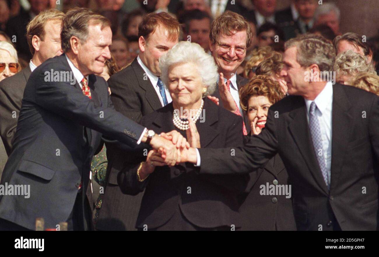 Former U.S. President George Herbert Walker Bush and wife Barbara congratulate their son Texas Gov. George W. Bush after his inauguration ceremony in Austin, Texas January 19. Governor Bush, now entering his second term, is an early favorite in the race for the Republican presidential nomination in 2000, even though he hasn't officially entered the contest.  LC/LJM/JDP Stock Photo