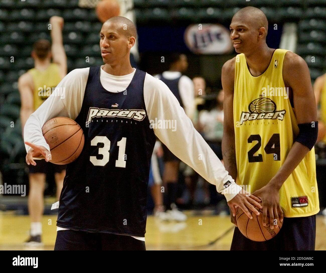 Indiana Pacers' Reggie Miller (L), jokes with rookie Jonathan ...