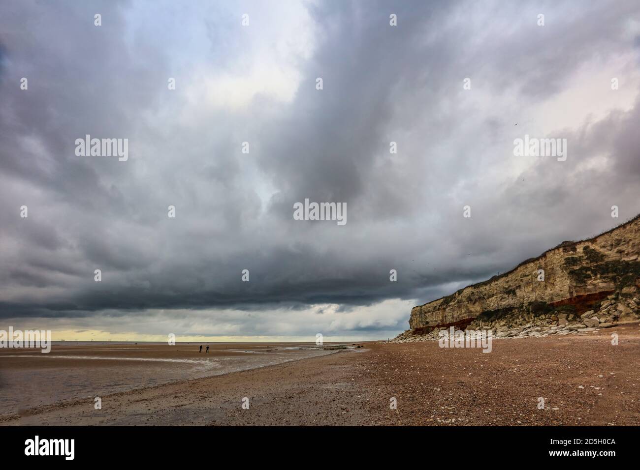 Consolidated Cretaceous strata form active cliffs north of the town of Hunstanton on the east coast of the Wash. Stock Photo
