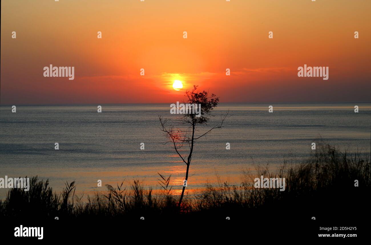Beautiful photo of the sea landscape at sunset Stock Photo - Alamy
