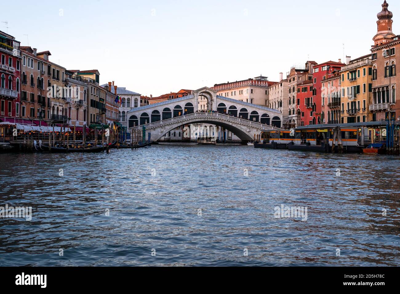 Heading towards the Rialto Bridge as the sun sets over the Grand Canal ...