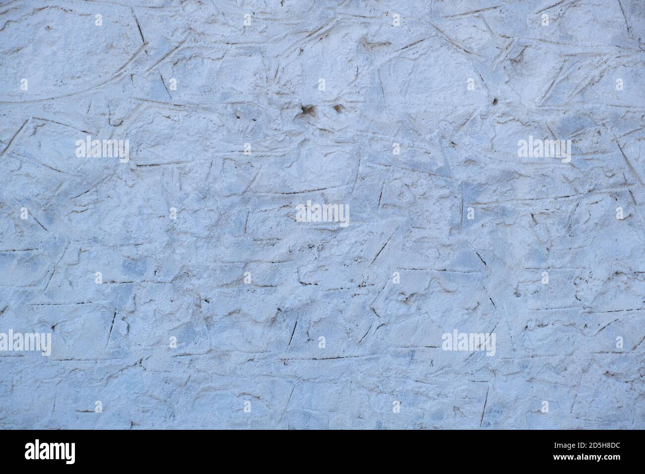 Old white wall, building facade texture background, Whitewashed aged wall, retro pattern plaster material. Stock Photo