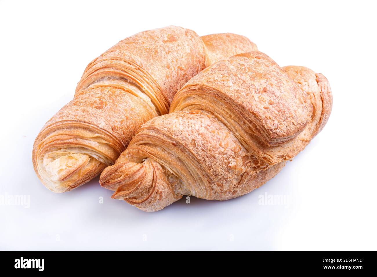 two croissants isolated on white background. closeup. Stock Photo
