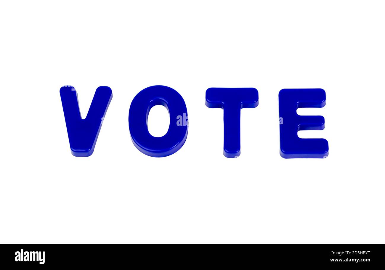 Text VOTE written in plastic letters on a white background. Concept for the electoral campaign. Stock Photo