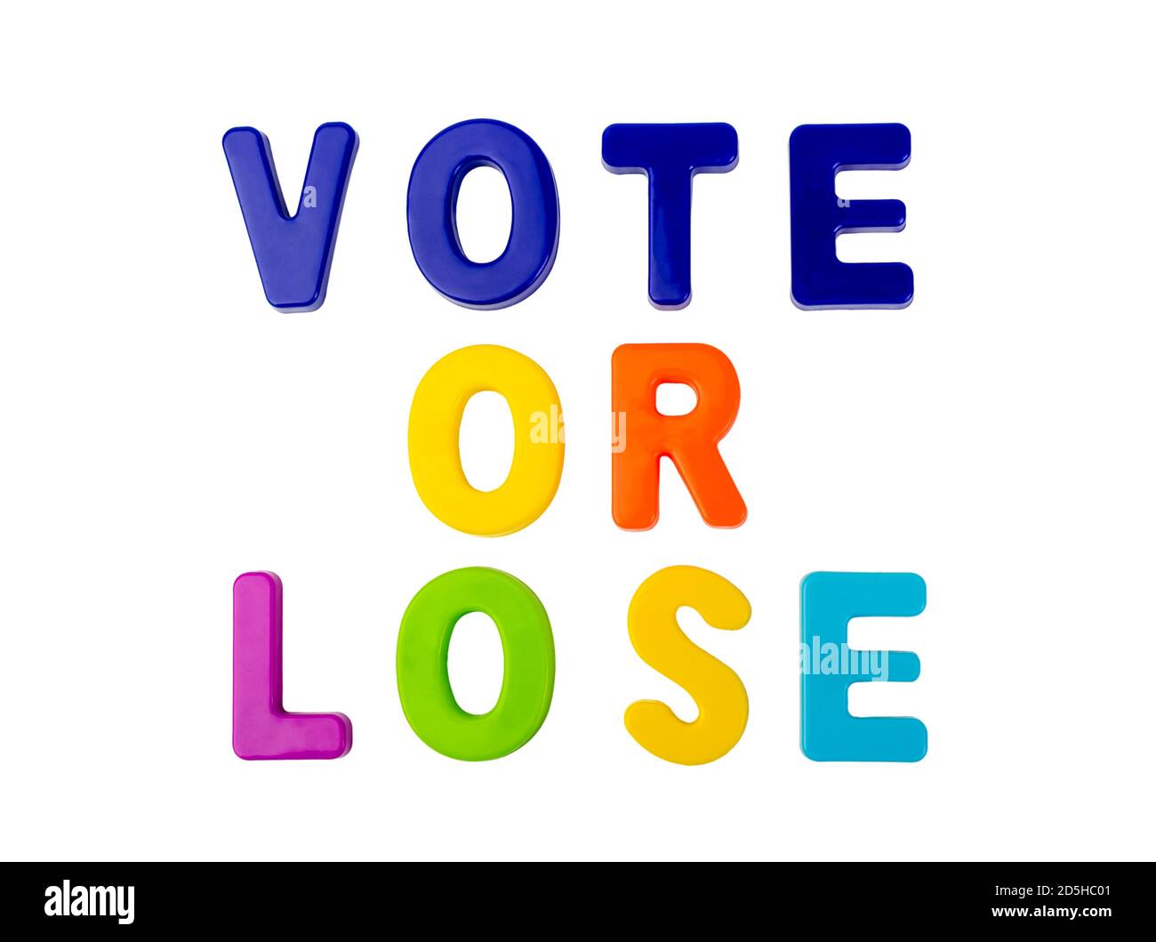 Text VOTE or LOSE written in plastic letters on a white background. Concept for the electoral campaign. Stock Photo