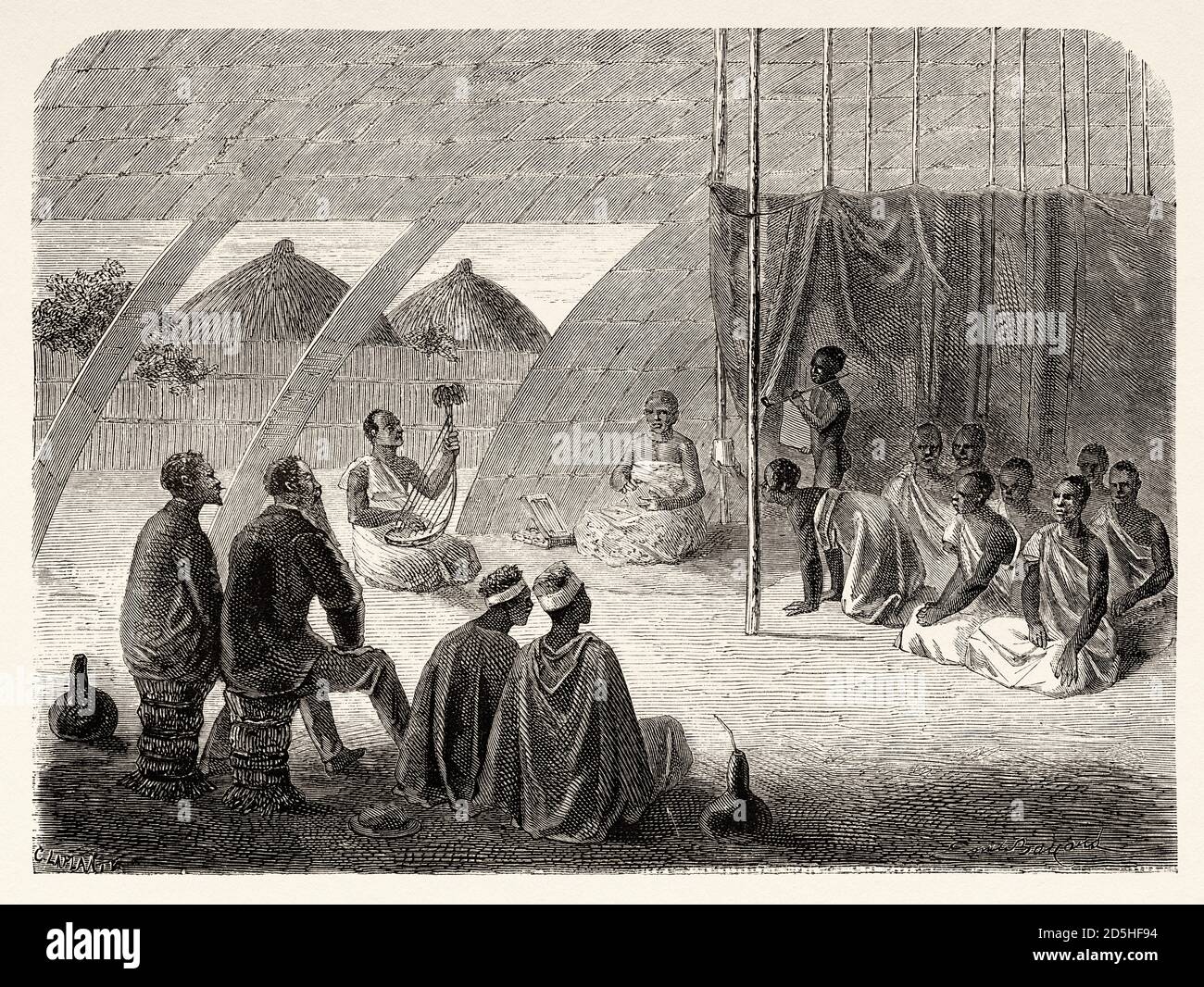 King Mutesa's guards at rations, Africa. Old XIX century engraved from Le Tour du Monde 1864 Stock Photo