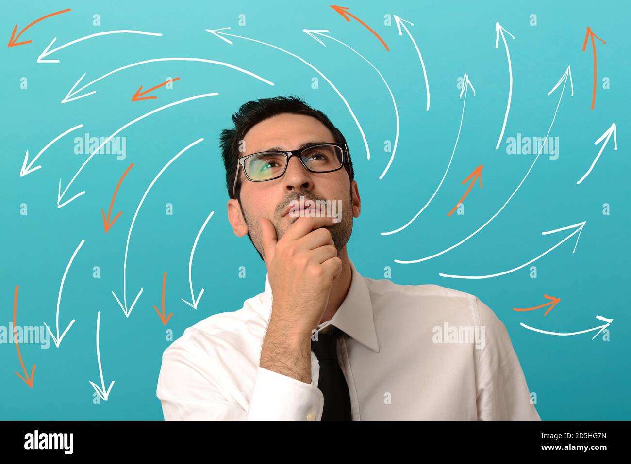 Confused and pensive man thinks about the best way forward. Stock Photo