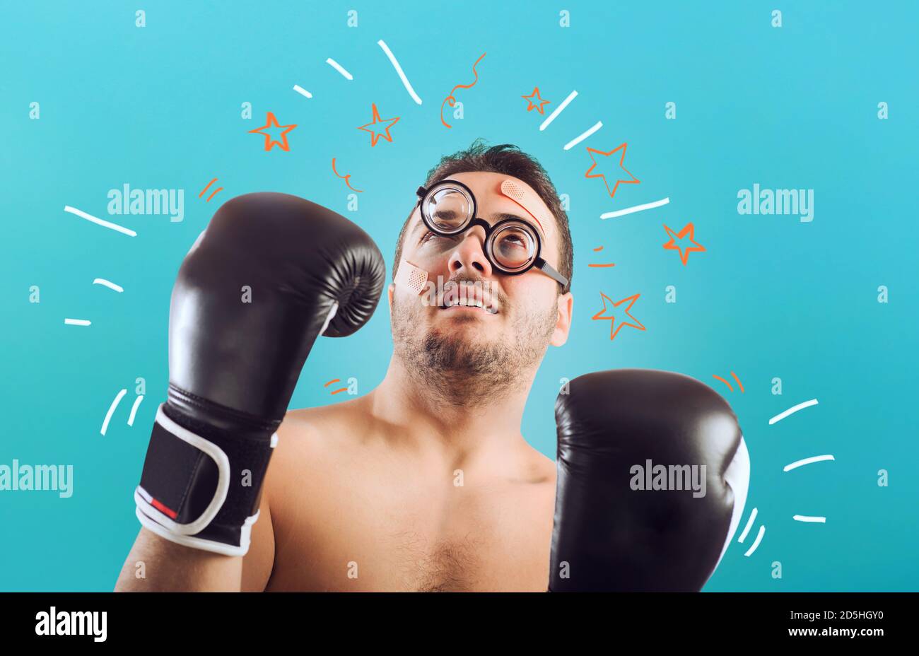 Loser goofy boxer is taking punches. Concept of failure Stock Photo