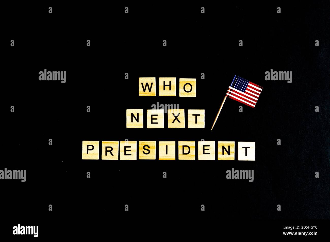 The phrase Who is the next American President - with an American flag in the background. A new election race in the United States. Primary. Candidates Stock Photo
