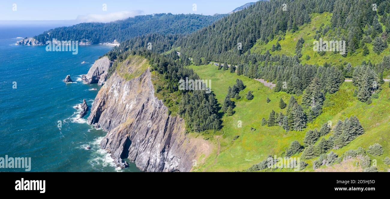 The Pacific Ocean washes against the dramatic coastline of Oregon, not far from Portland. This part of the United States is known for its scenery. Stock Photo