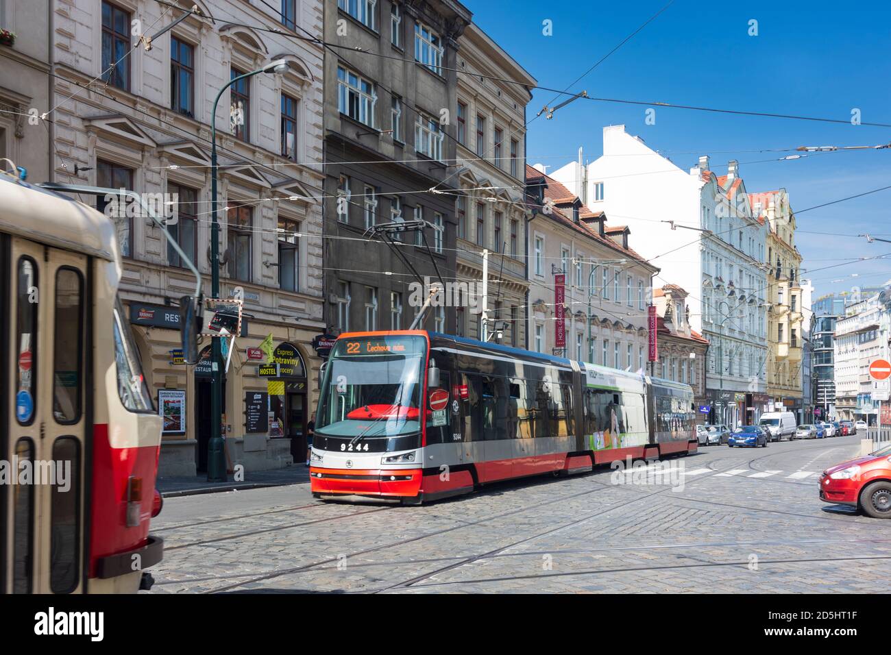 Praha: streetcars old (Tatra) and new (Skoda) in Nove Mesto, New Town, Praha, Prag, Prague, Czech Stock Photo