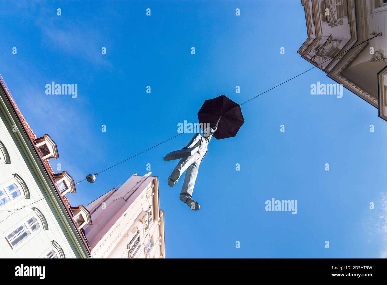 Sculpture umbrella man prague hires stock photography and images Alamy