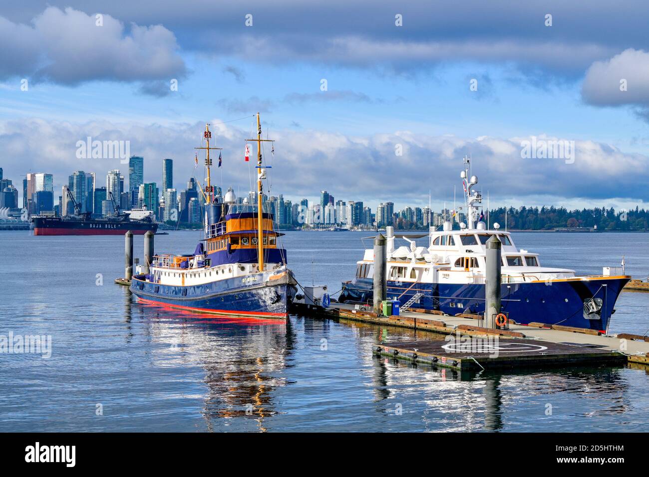 St. Eval , wooden steam tug, converted to diesel motor yacht. Docked at