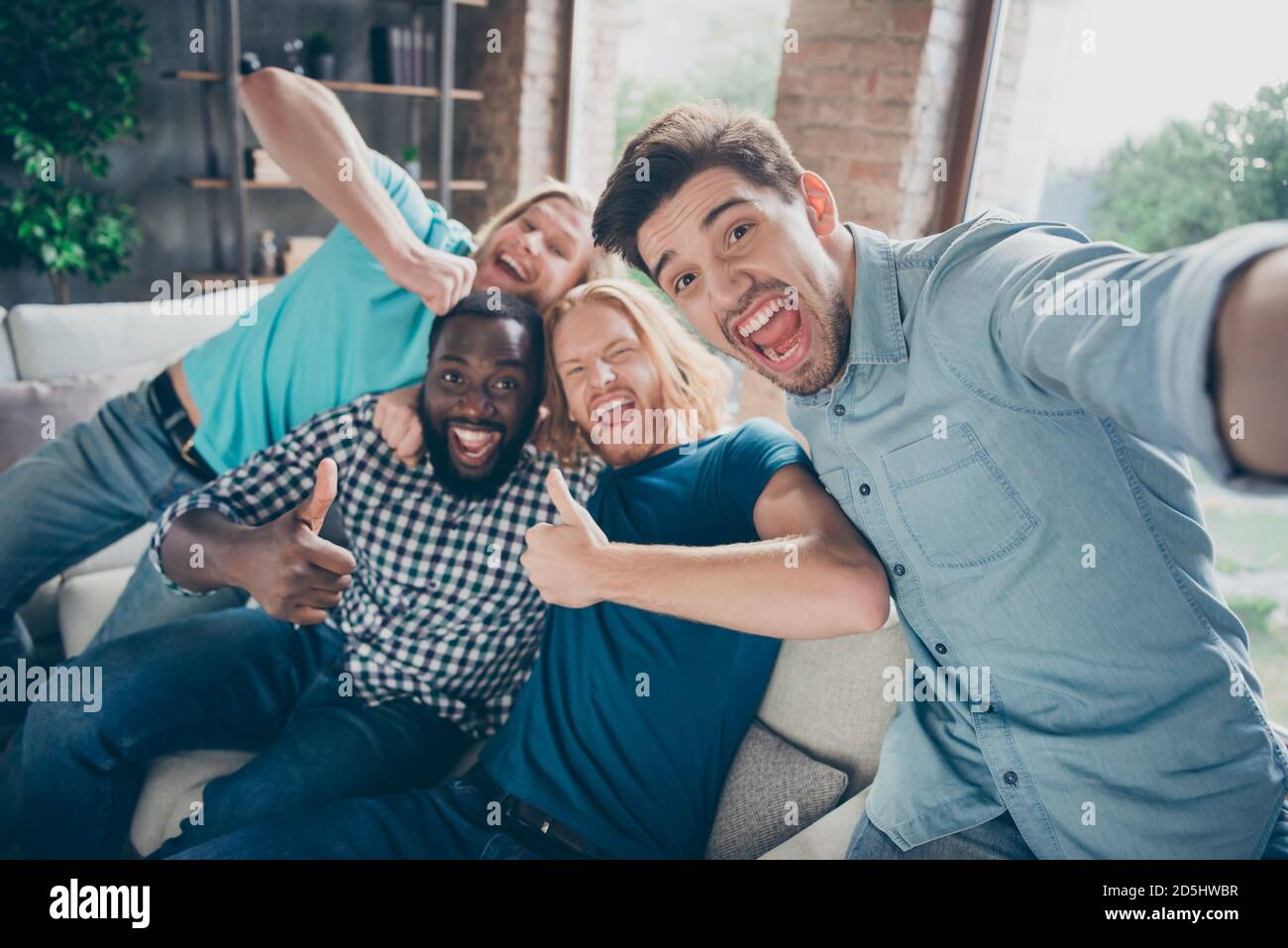 Gathering party sit sofa hi-res stock photography and images - Alamy