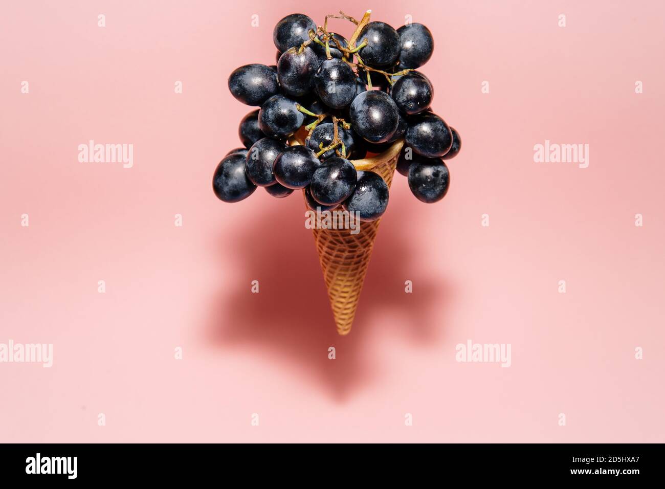 Fresh grapes in a flying ice cream cone Stock Photo