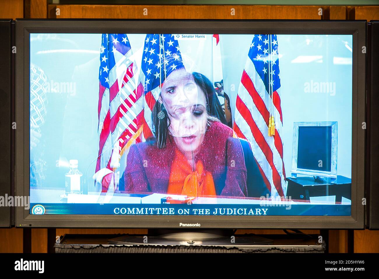 Washington, Dc, USA. 13th Oct, 2020. A long-exposure image shows a TV monitor cutting between Democratic Senator from California Kamala Harris and Supreme Court nominee Judge Amy Coney Barrett during Barrett's confirmation hearing before the Senate Judiciary Committee in the Hart Senate Office Building in Washington, DC, USA, 13 October 2020. US President Donald J. Trump nominated Barrett to fill the vacancy Justice Ruth Bader Ginsburg left when she passed away on 18 September 2020. (Photo by Pool/Sipa USA) Credit: Sipa USA/Alamy Live News Stock Photo