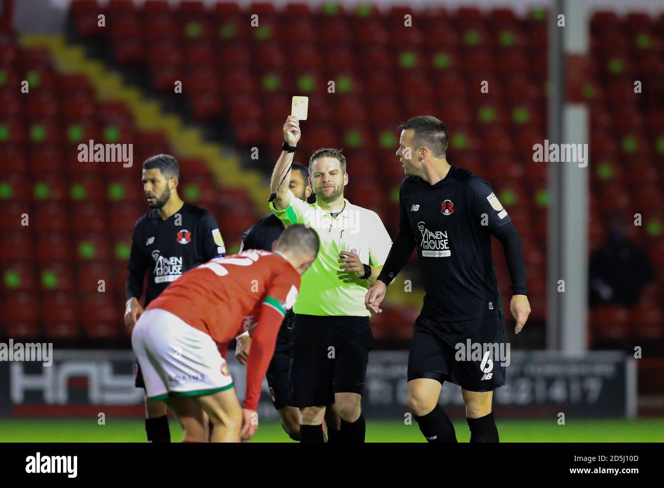 Walsall, UK. 13th Oct, 2020. Christopher Pollard books Rory Holden of Walsall during the Sky Bet League 2 match between Walsall and Leyton Orient at the Banks's Stadium, Walsall, England on 13 October 2020. Photo by Nick Browning/PRiME Media Images. Credit: PRiME Media Images/Alamy Live News Stock Photo