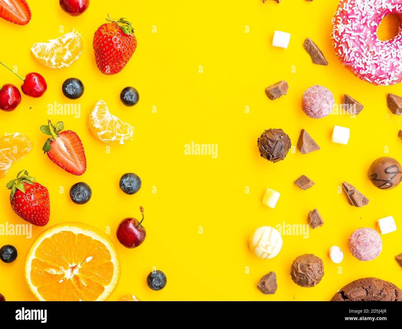 Healthy vs unhealthy dessert, dieting concept. Blueberries strawberries