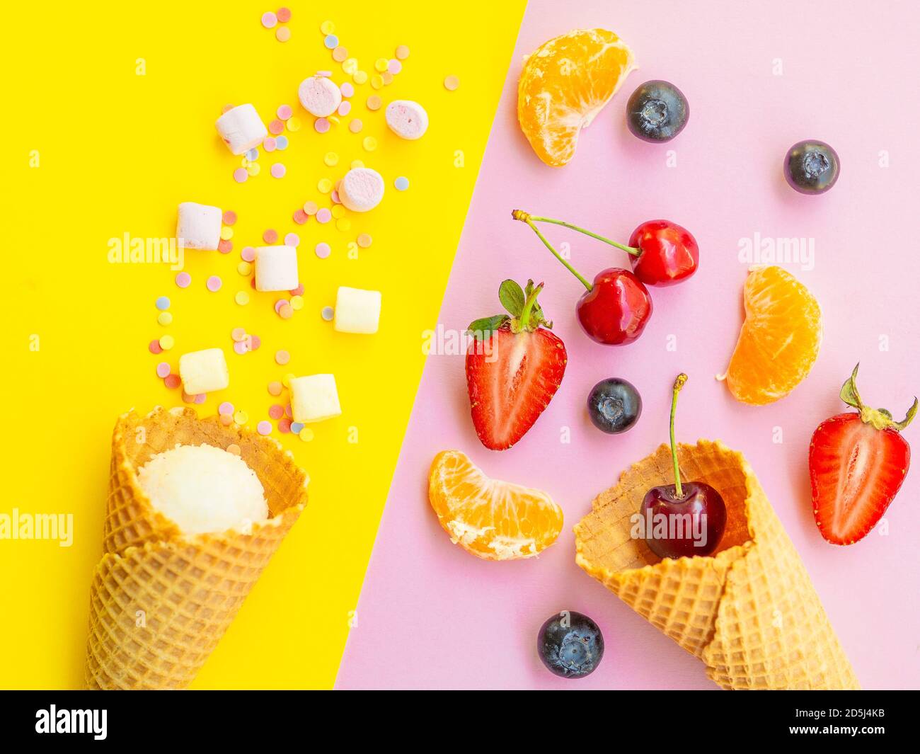 Healthy vs unhealthy dessert, dieting concept. Blueberries strawberries