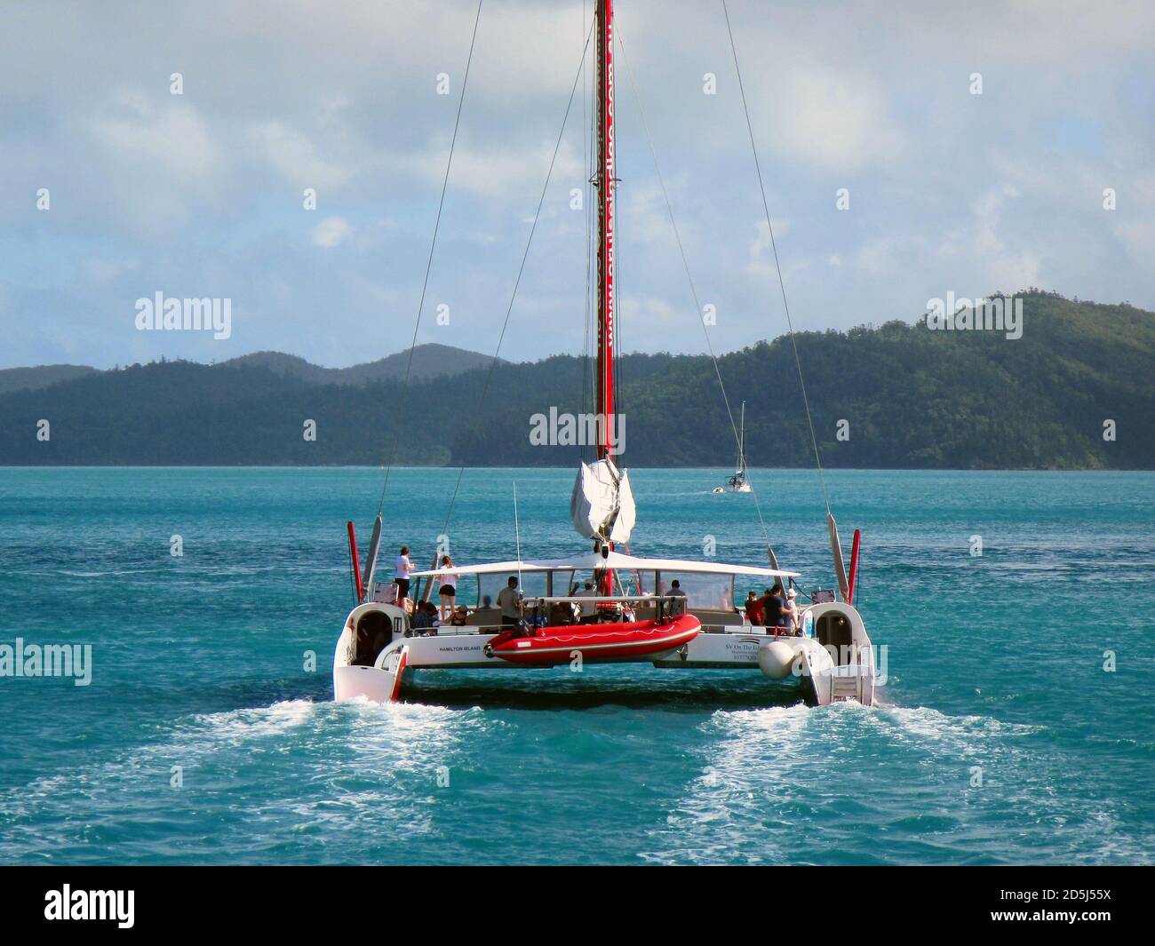 Catamaran Sailing Through The Whitsunday Islands Queensland Australia Stock Photo Alamy
